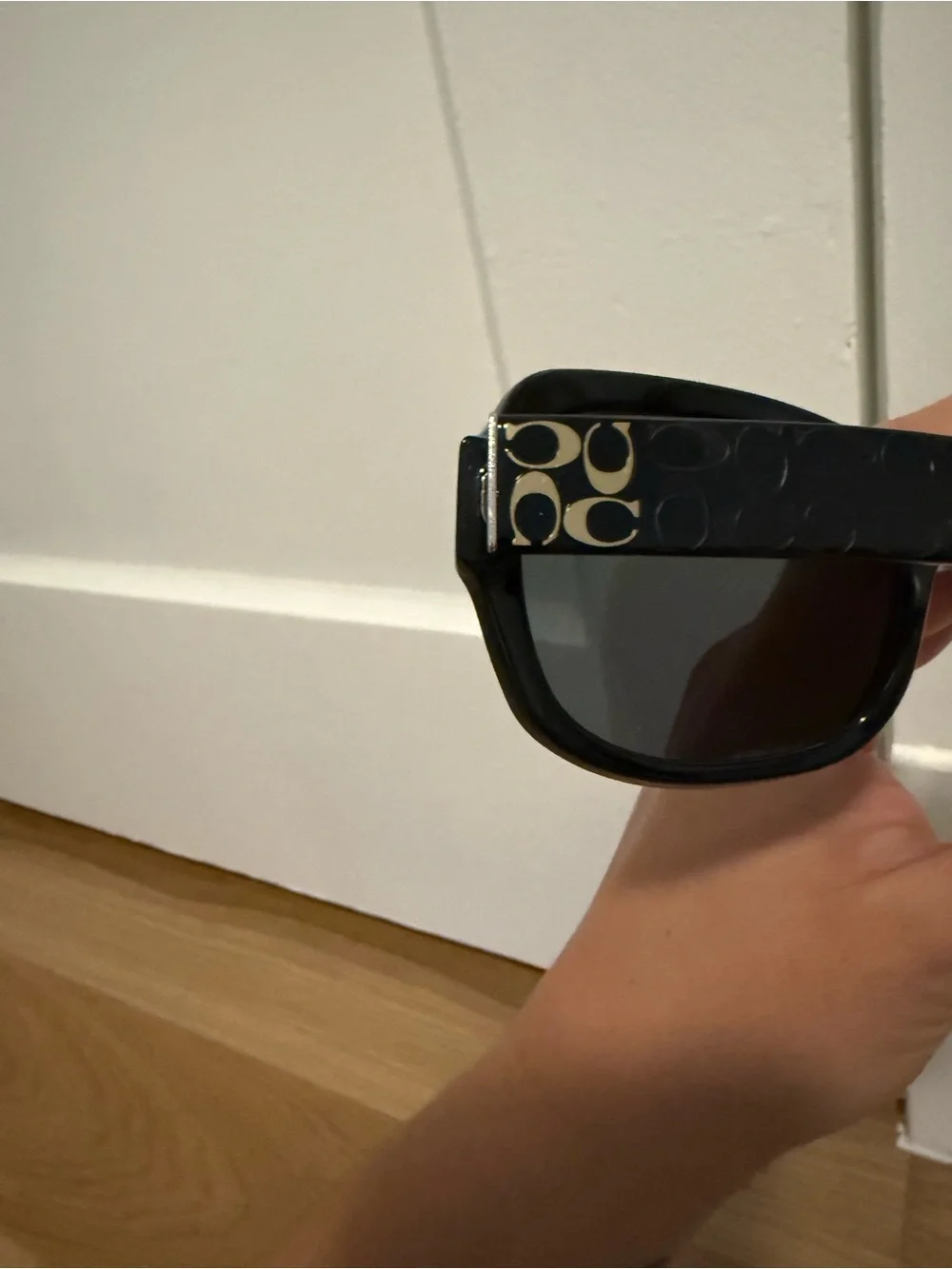 Coach “Emma” Black Logo-Accent Sunglasses with Gold and Pink Details